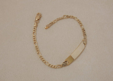 BRACCIALE UOMO ORO GIALLO CON PIASTRINA