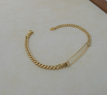 BRACCIALE UOMO IN ORO GIALLO CON PIASTRINA